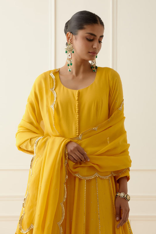 Women Wearing Yellow Dupatta.