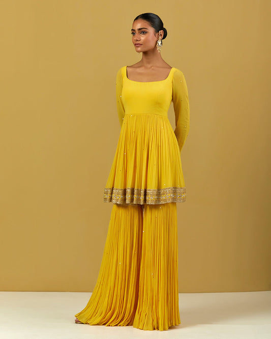 Women Wearing Yellow Garara
