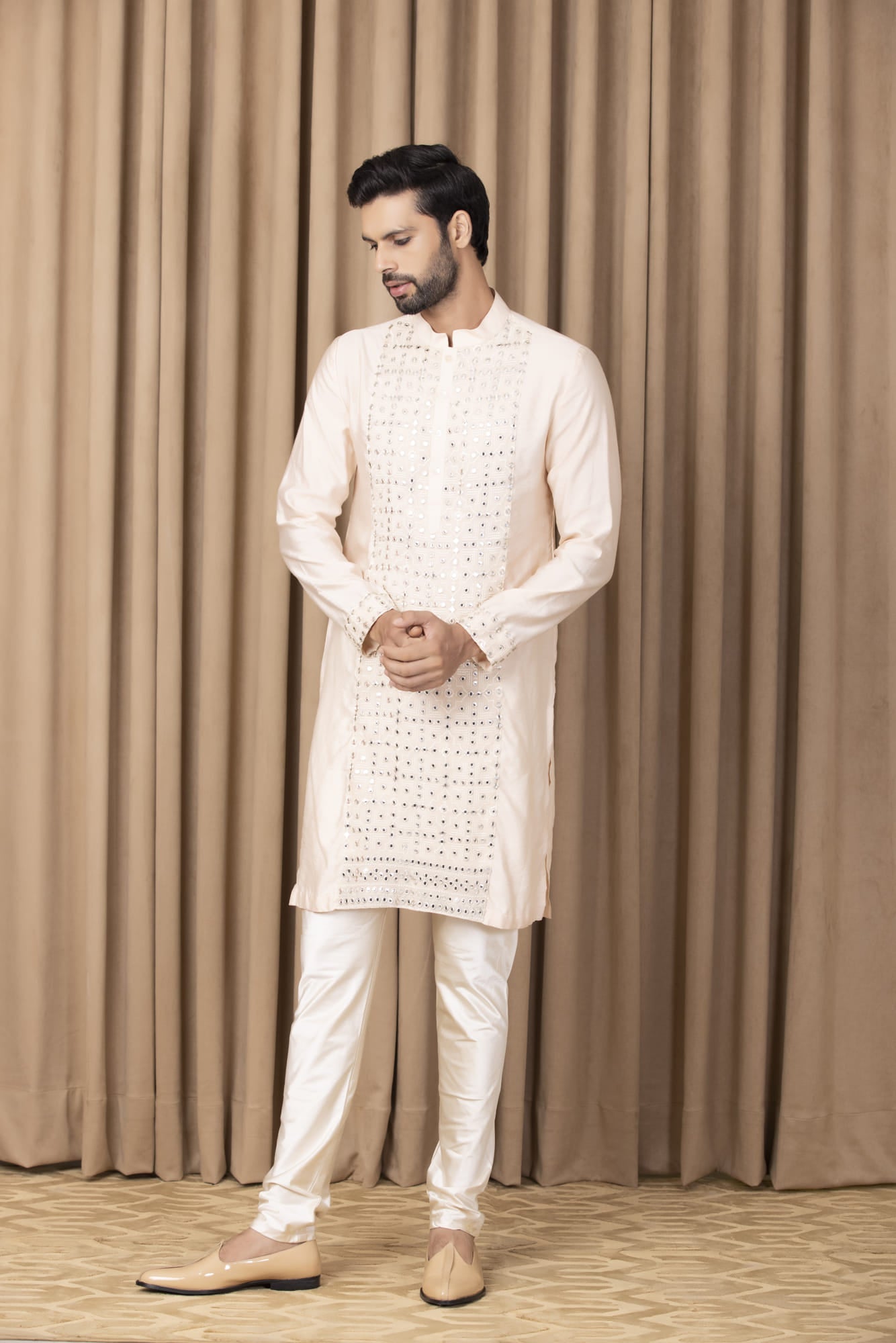 Men Wearing Peach Kurta Set.