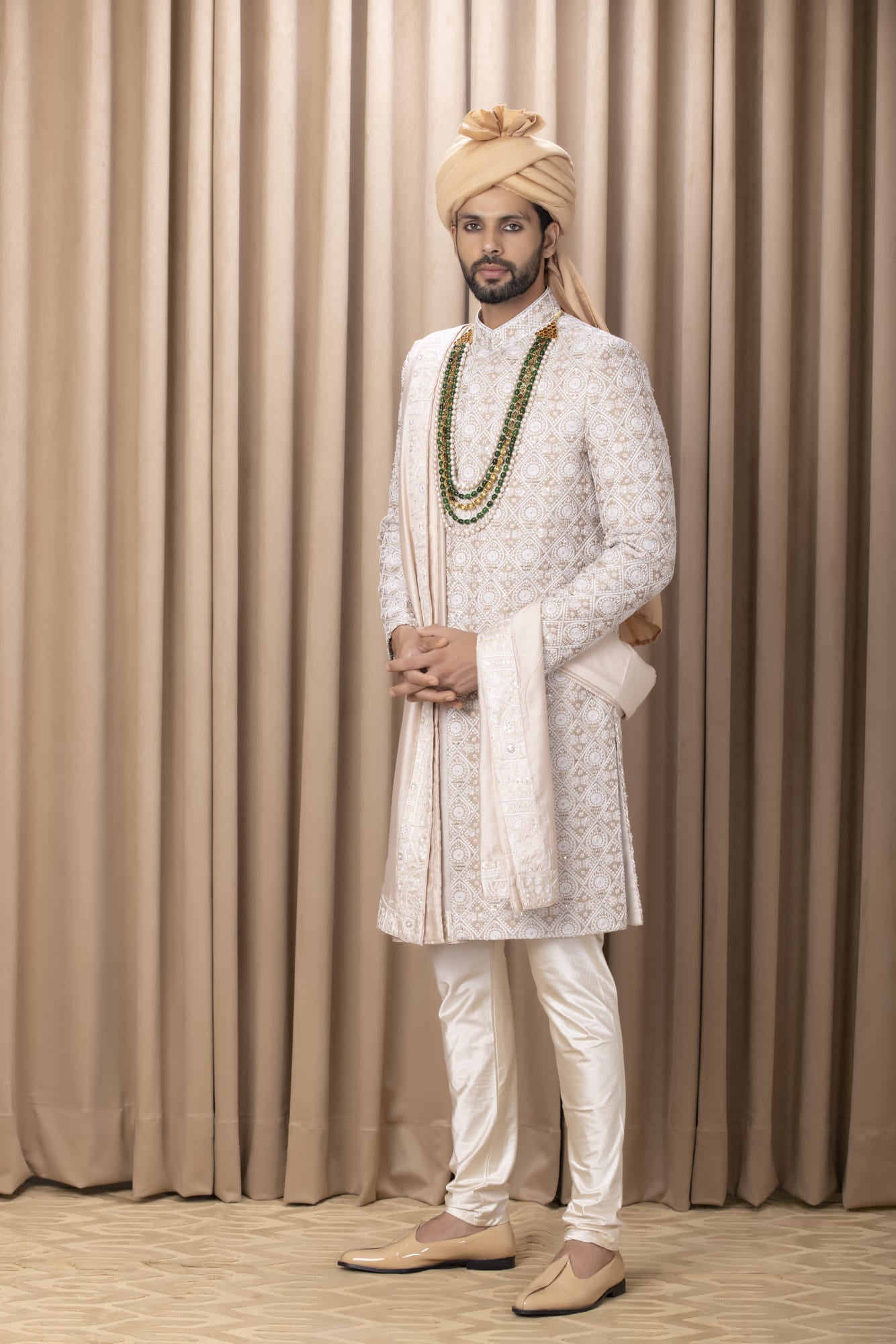 Men Wearing White Sherwani Set.