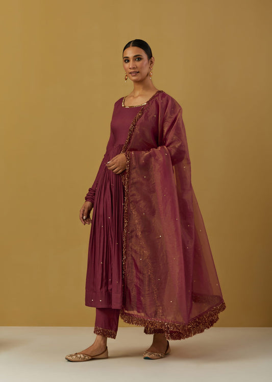 Women Wearing Maroon Anarkali Sets.