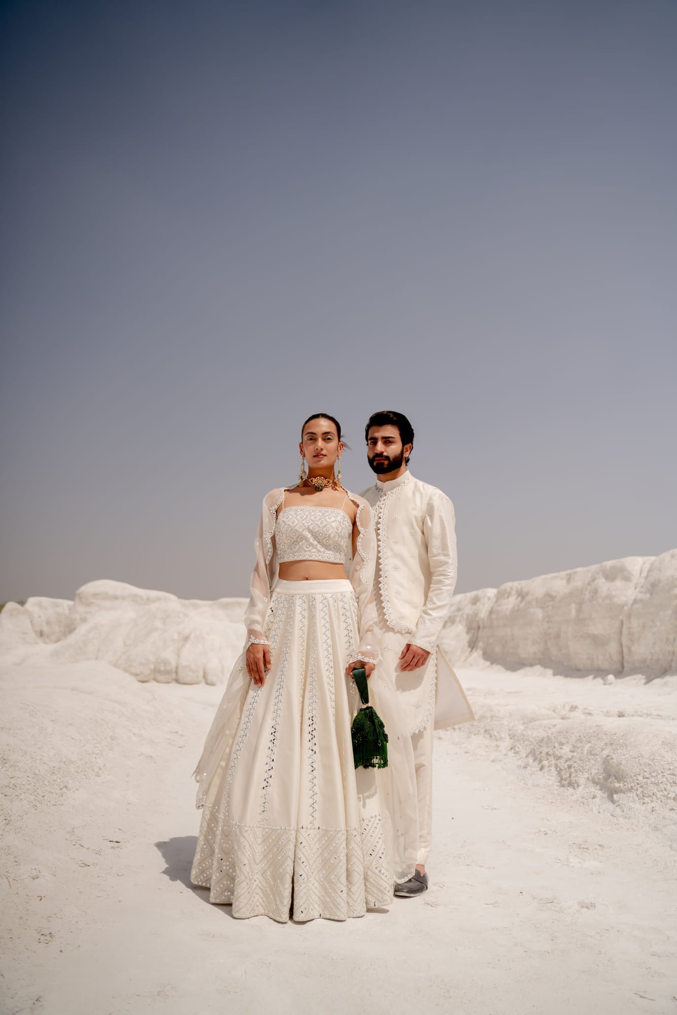 Women Wearing White Lehenga Set.