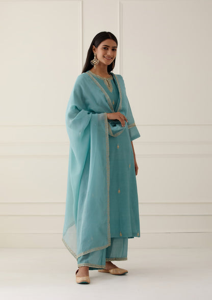 Women Wearing Blue Kurta Set.