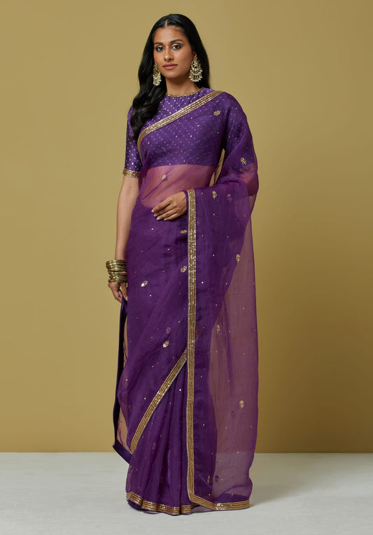 Women Wearing Purple Saree.