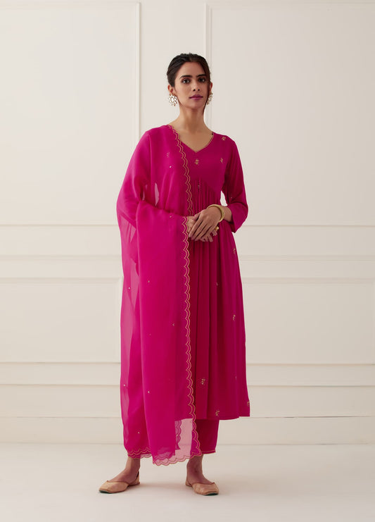 Women Wearing Pink Kurta Set.