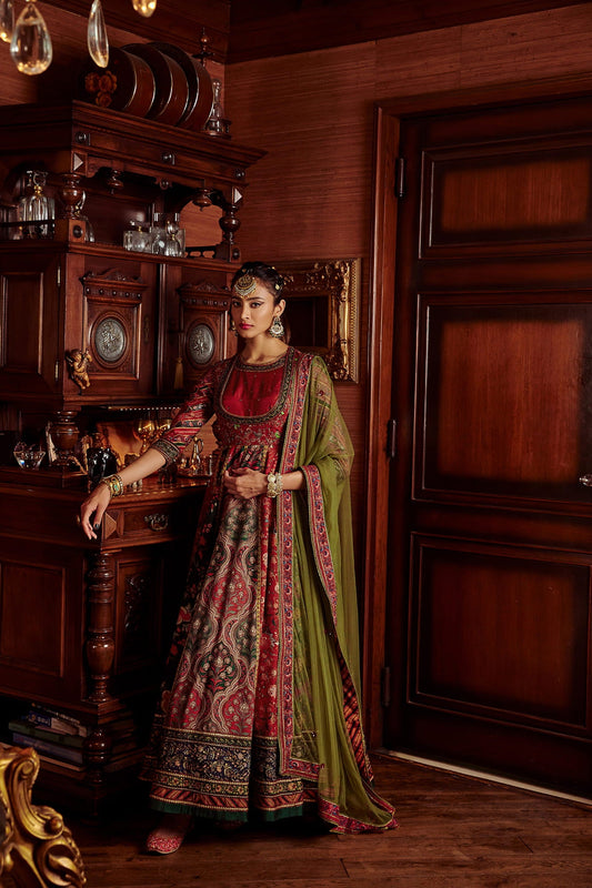 Women Wearing Multi Color Anarkali Set.