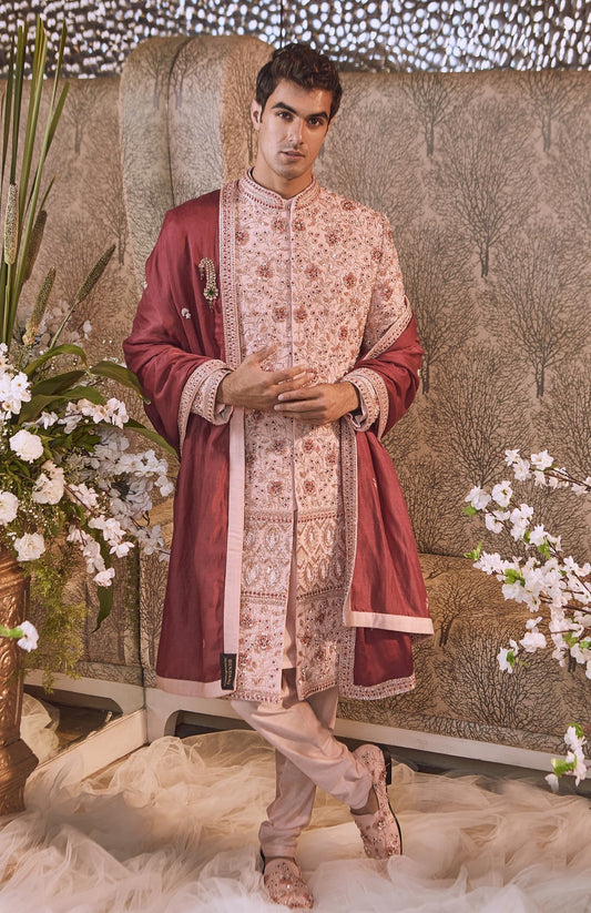 Men wearing pink sherwani