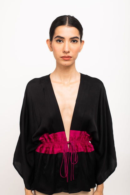 Women Wearing Black Cape Top.