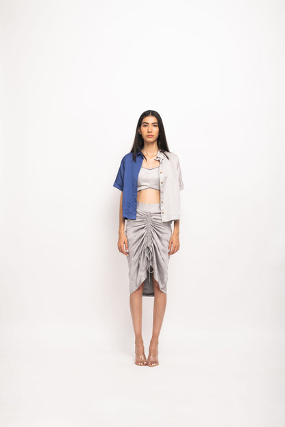 Women Wearing Grey Skirt Set