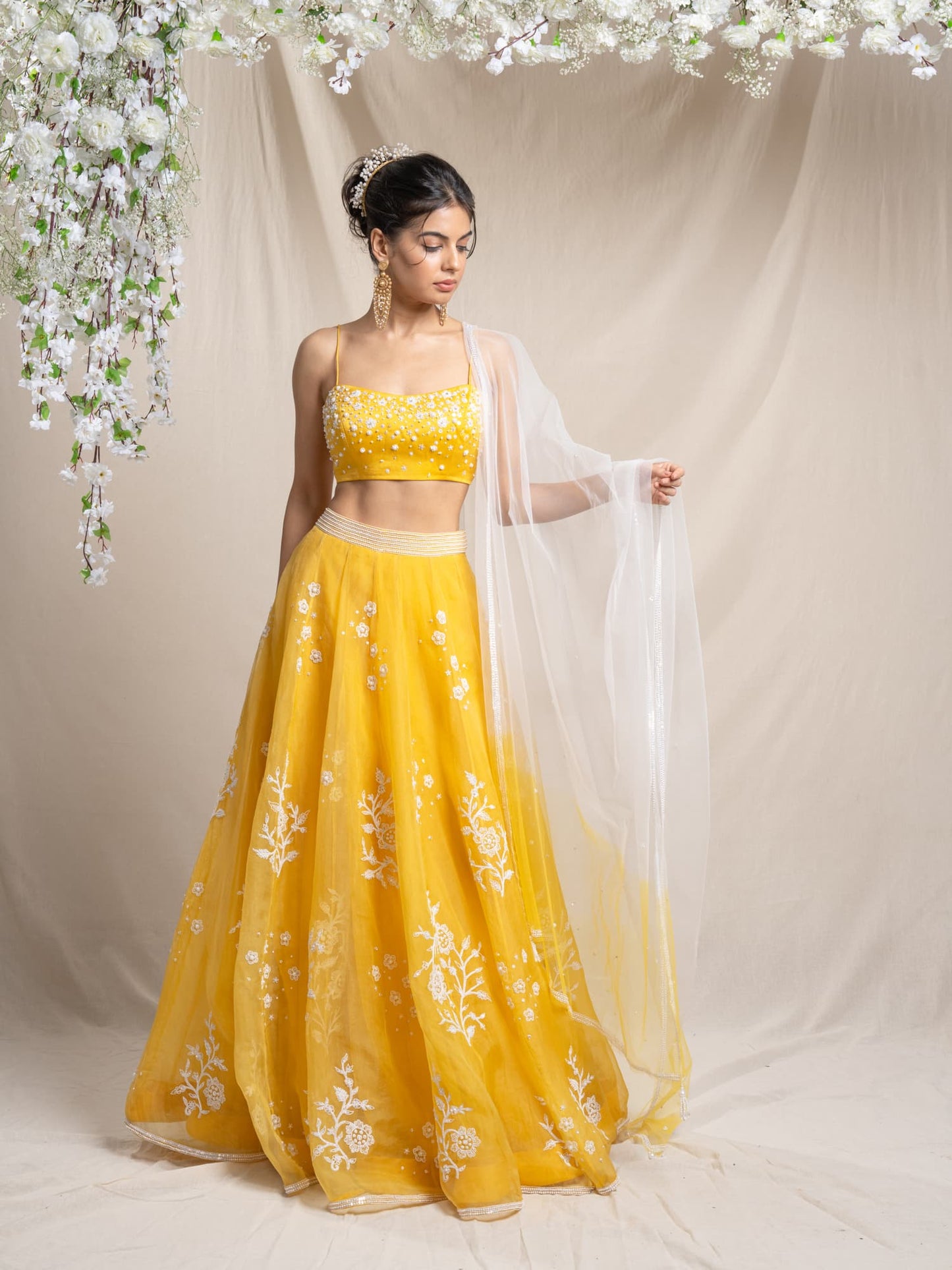 Women Wearing  Yellow Organza Lehenga Set