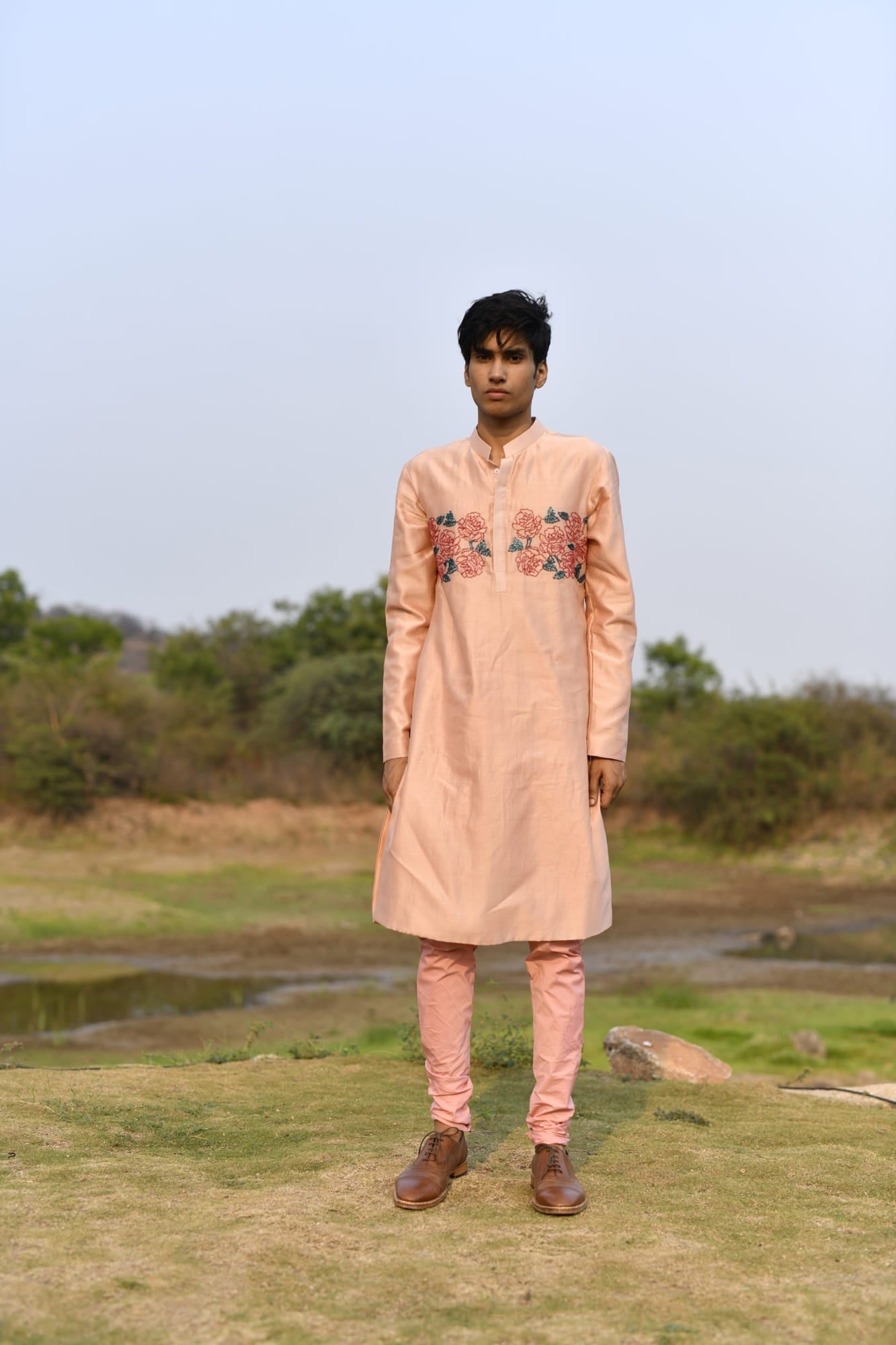 Man Wearing pink Kurta Set