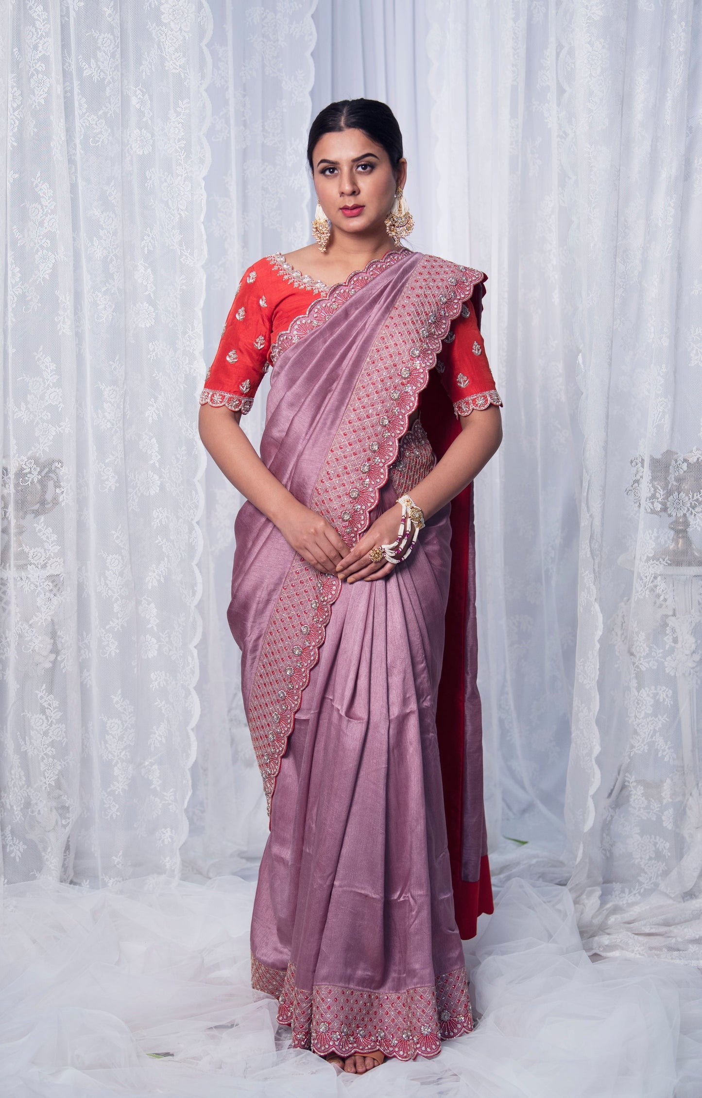 Women Wearing Peach Saree Set. 