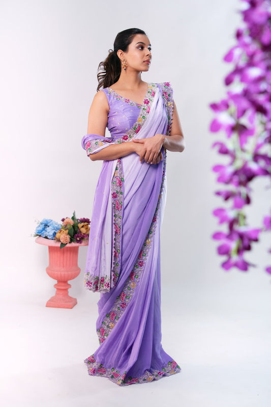 Women Wearing Purple Saree Set.