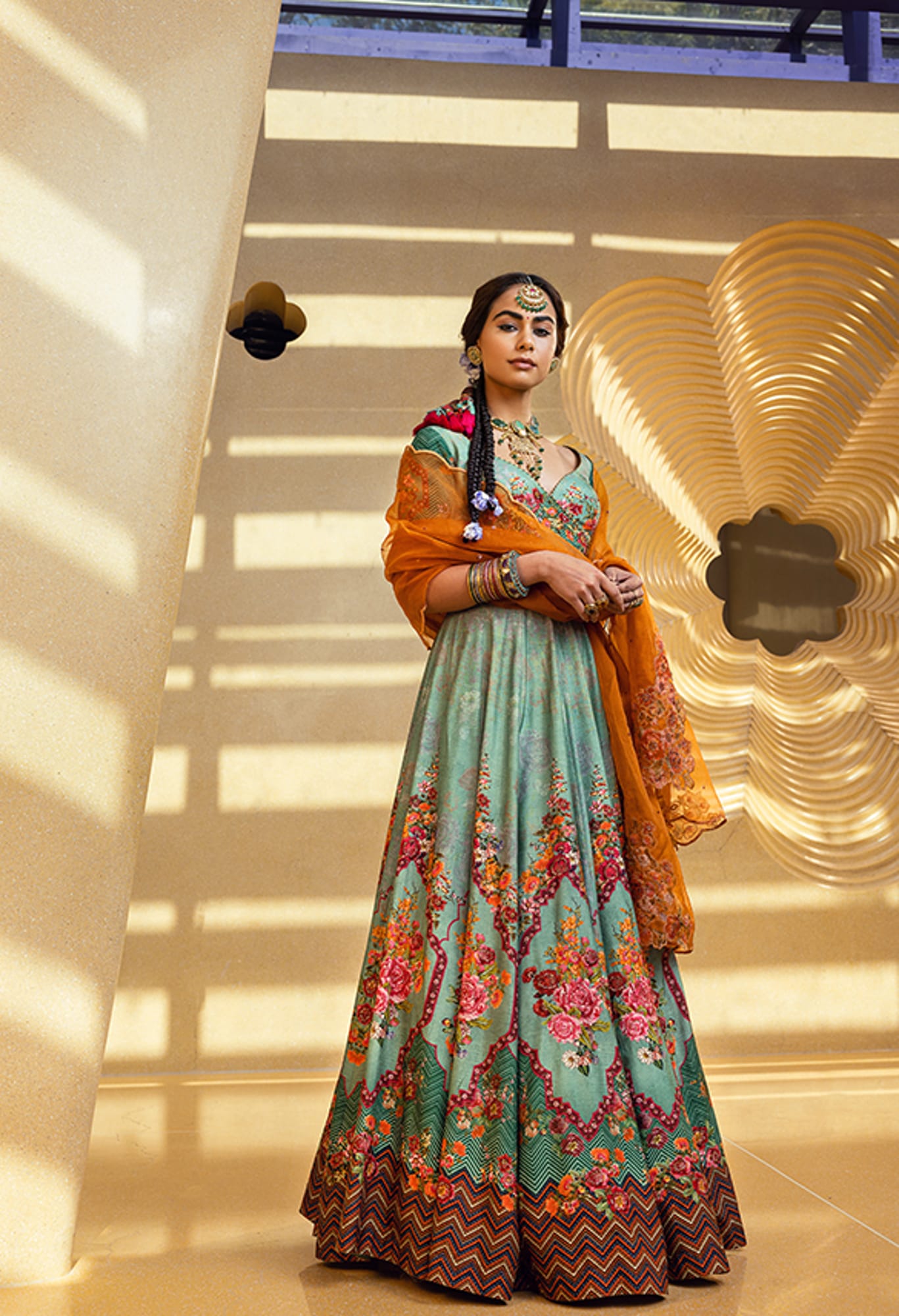 Womens Wearing Green Lehenga Set with Organza Dupatta.