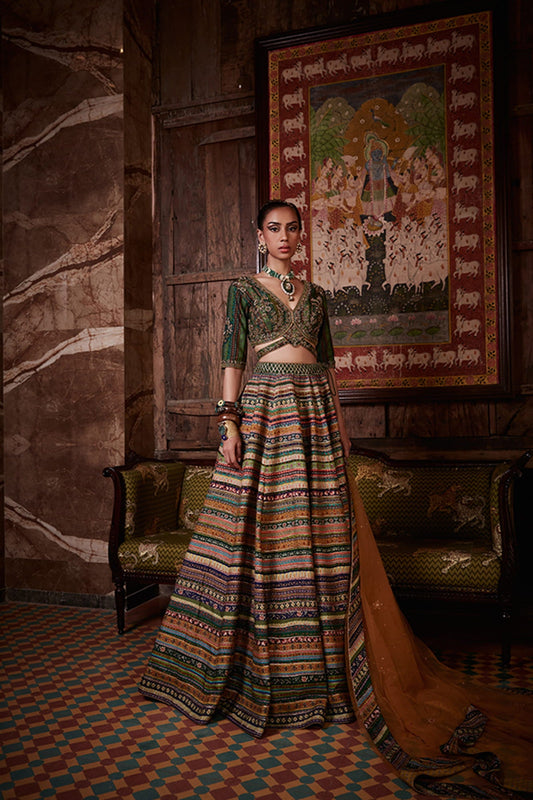 Women Wearing Green Lehenga Set.