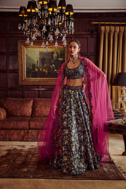 Women Wearing Blue Lehenga Set.