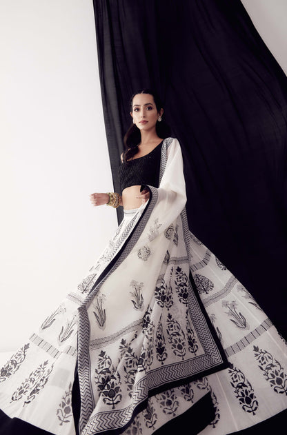 Women Wearing Black And White Lehenga