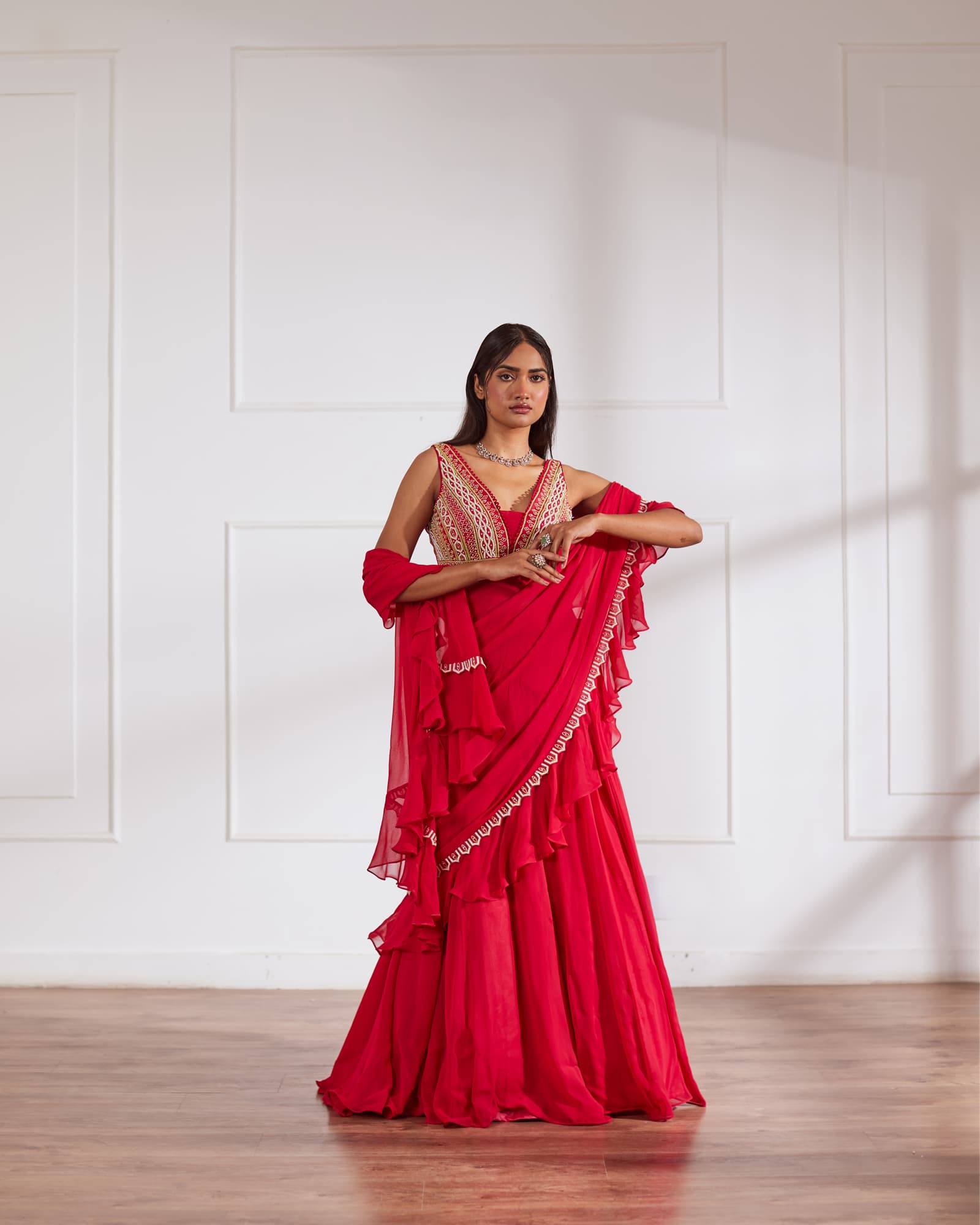 Women wearing Coral Saree set