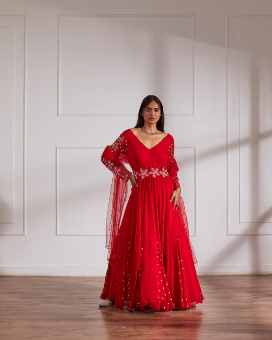 Women wearing Red Anarkali Set