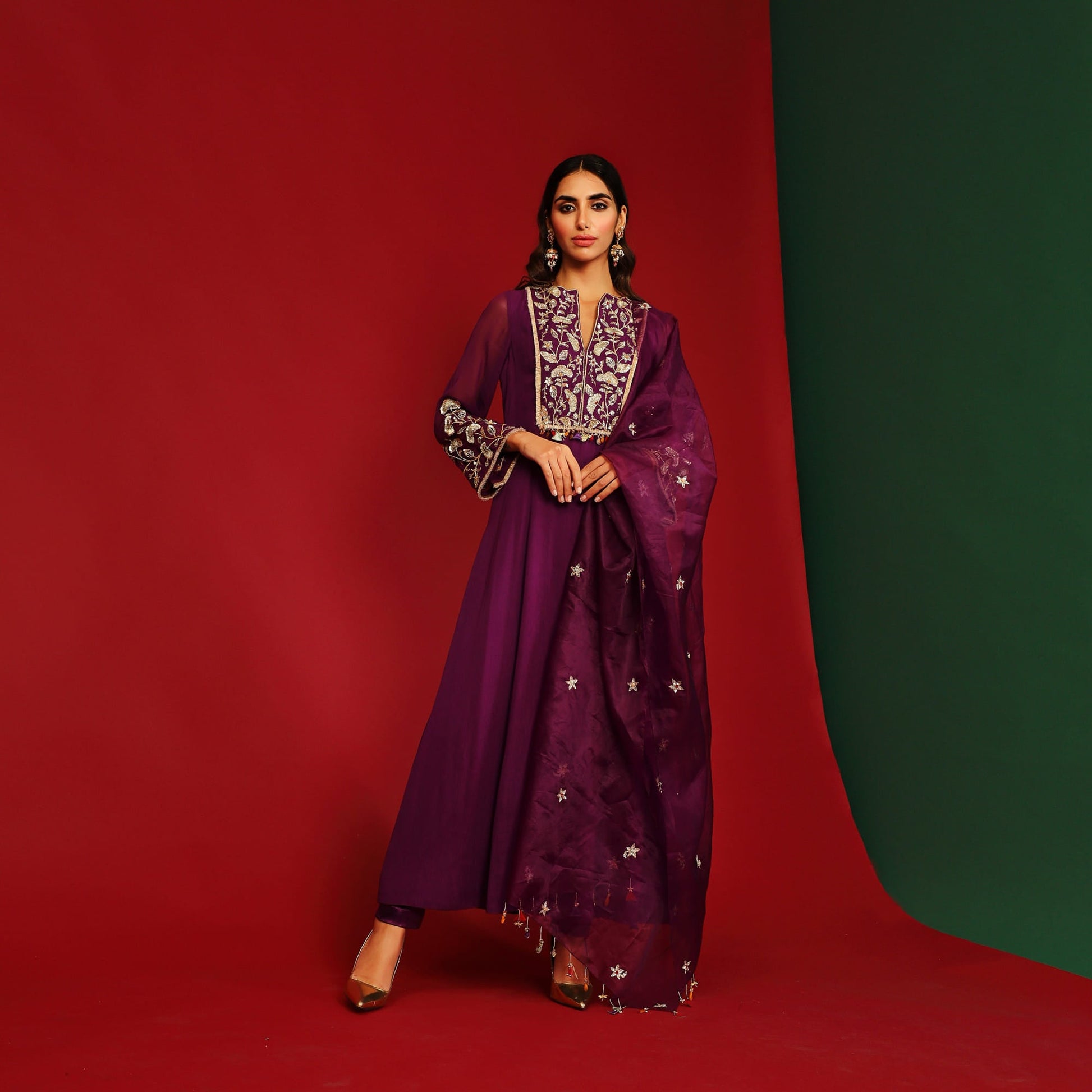 Women Wearing Purple Kurta Set