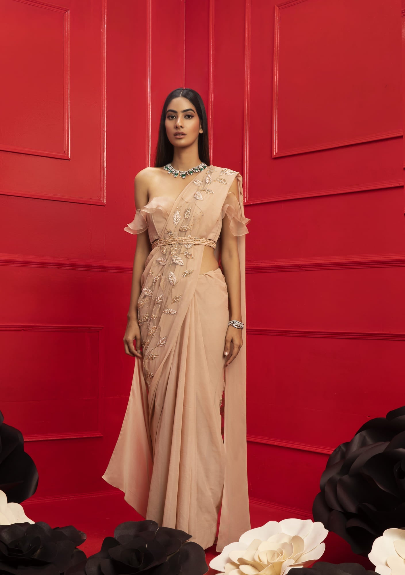 Women Wearing Beige Saree With Blouse And Belt