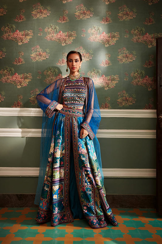 Women Wearing Blue Lehenga Set.