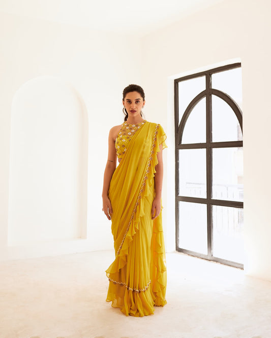 Women wearing Yellow Saree set