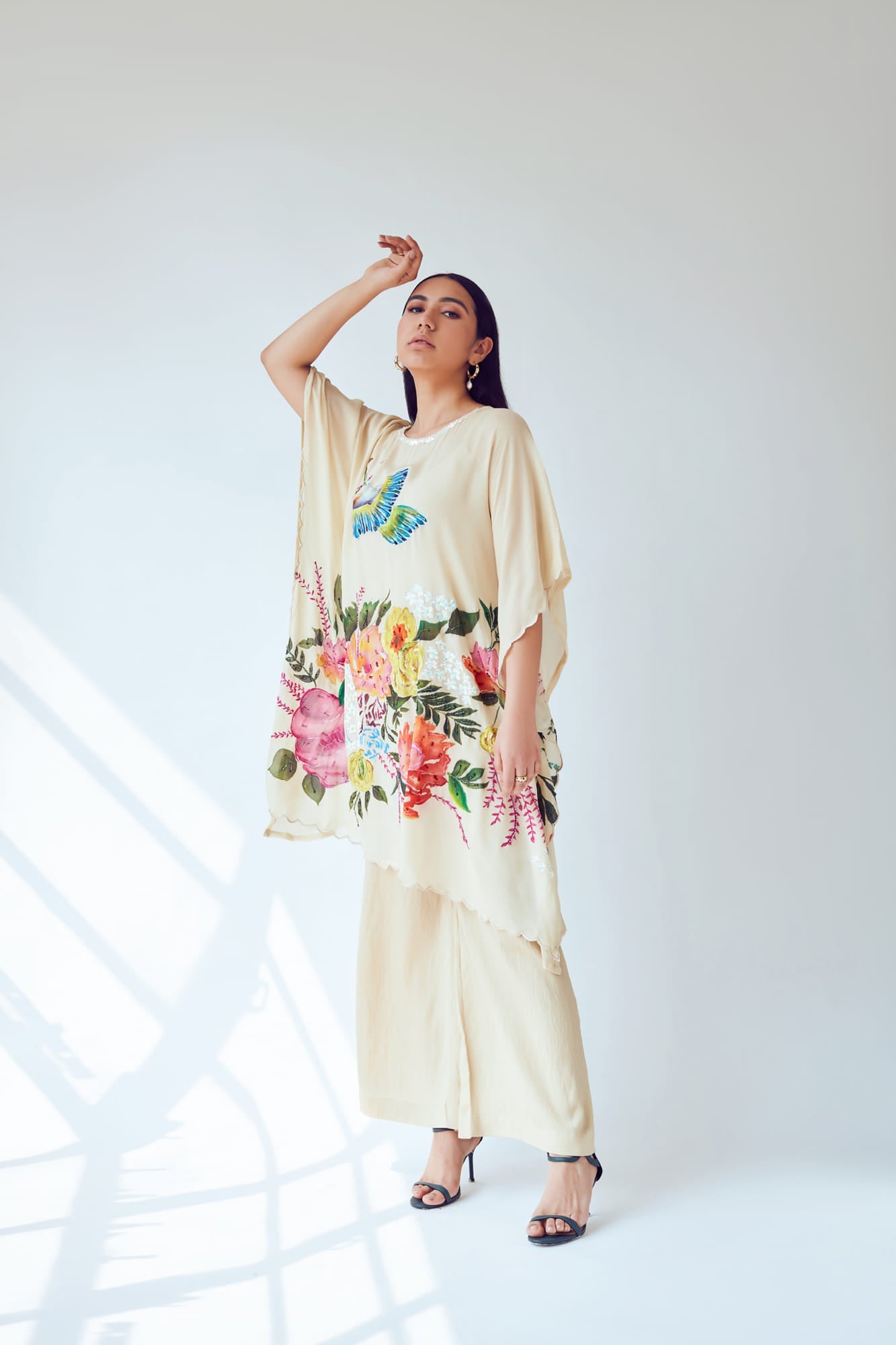 Women Wearing Yellow Kaftan Set.