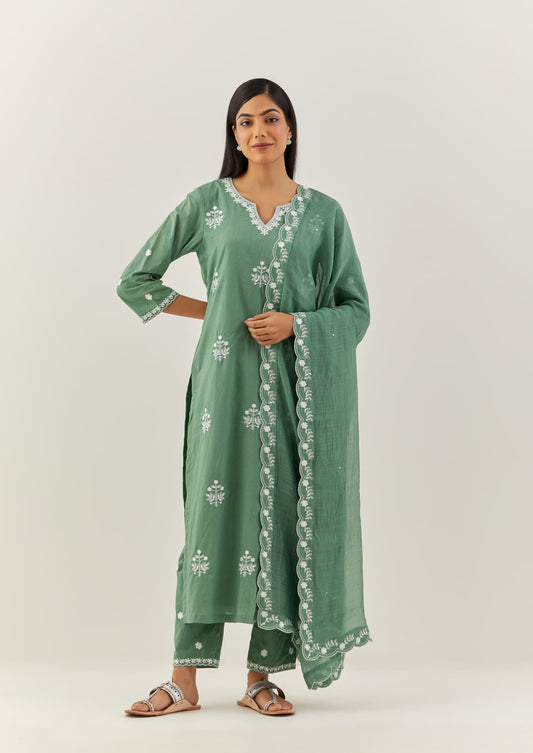 Women Wearing Green Kurta Set.