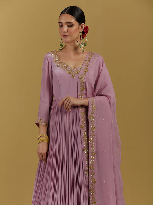 Women Wearing Purple Anarkali Set.