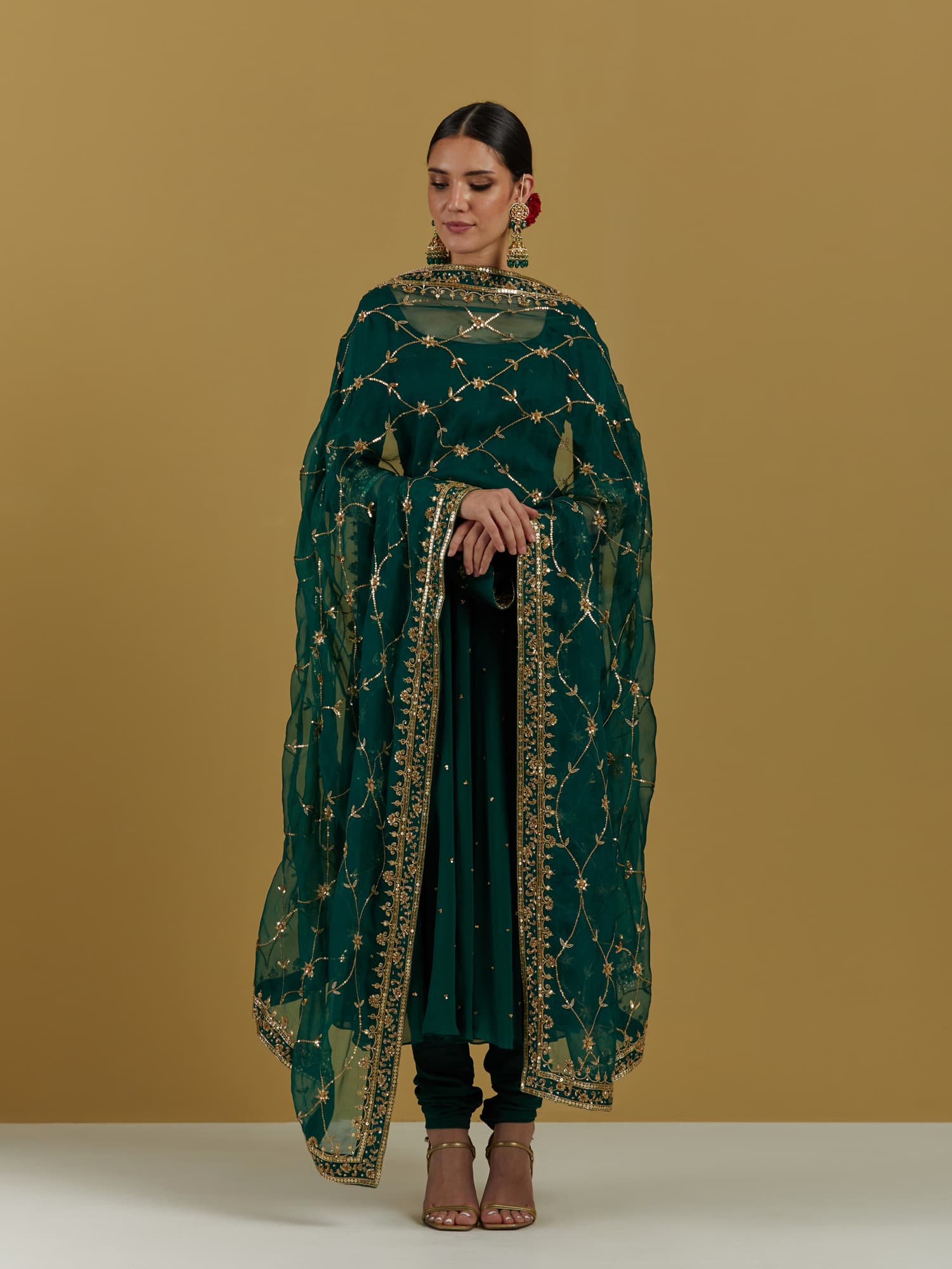 Women Wearing Green Anarkali Set.