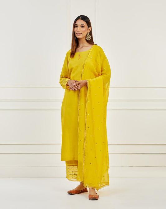 Women Wearing Yellow Kurta Set.