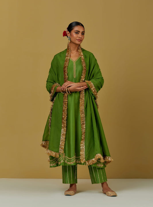 Women Wearing Green Kurta Set